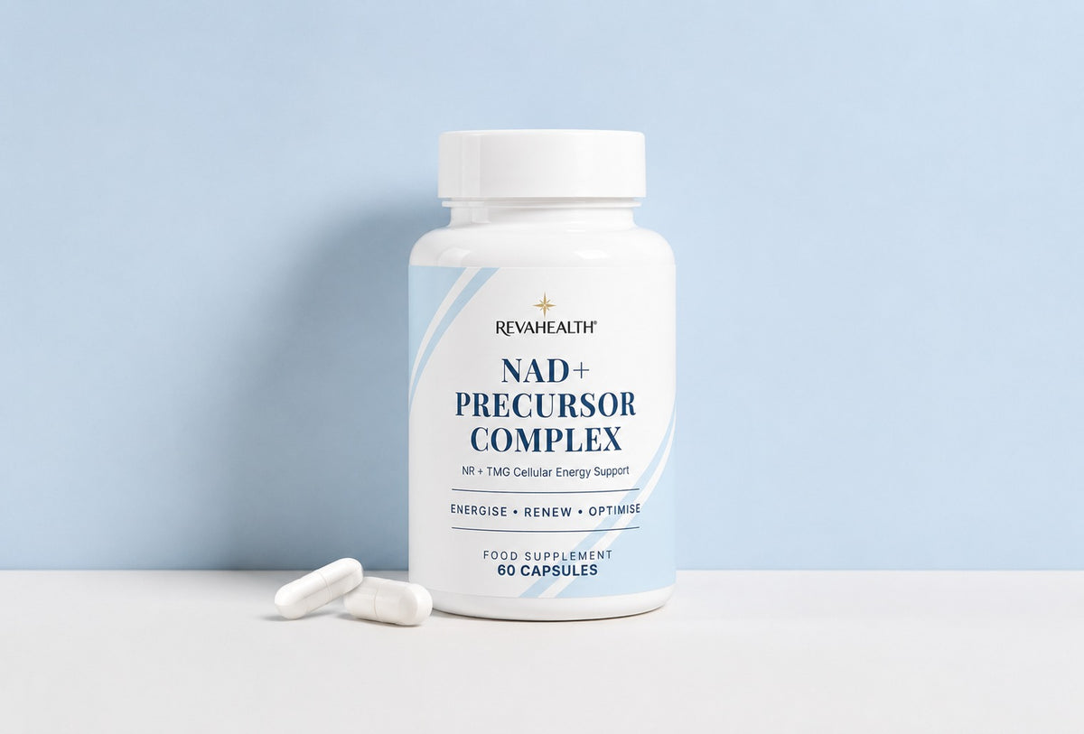 NAD+ Precursor Complex bottle photographed on a pale blue surface with two capsules beside it